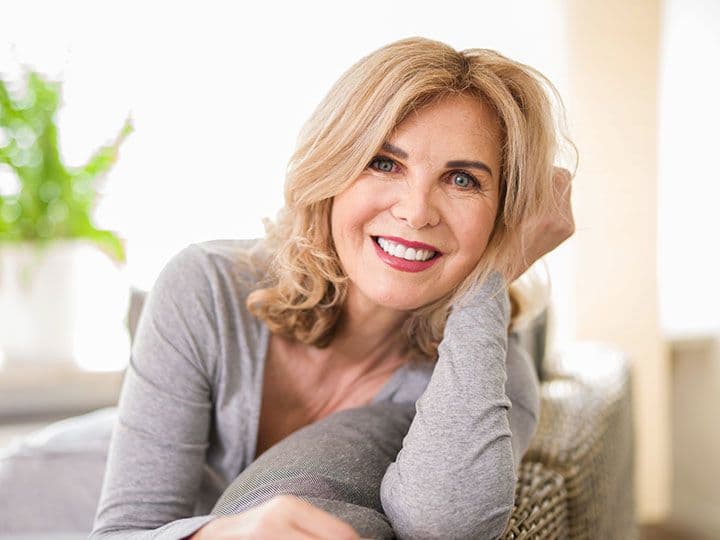 Husband and wife smiling