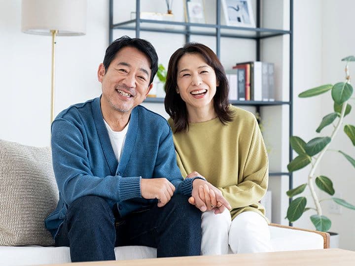 Husband and wife smiling