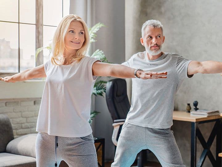 Husband and wife smiling