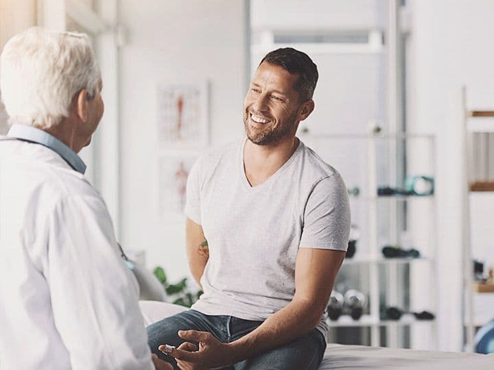 Husband and wife smiling