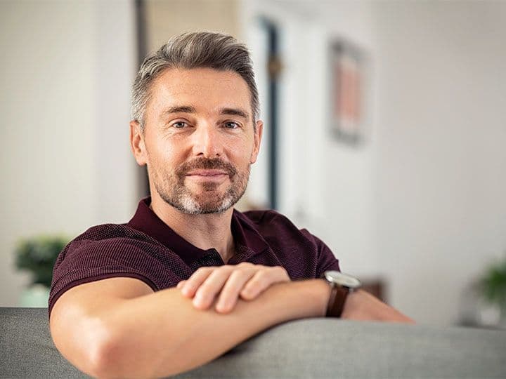 Husband and wife smiling