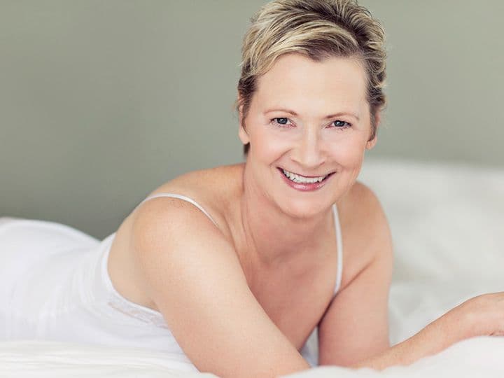 Husband and wife smiling