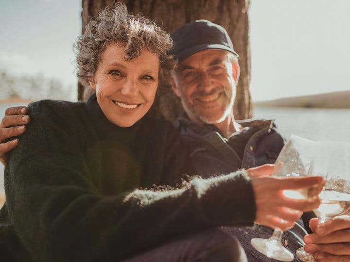 Husband and wife smiling